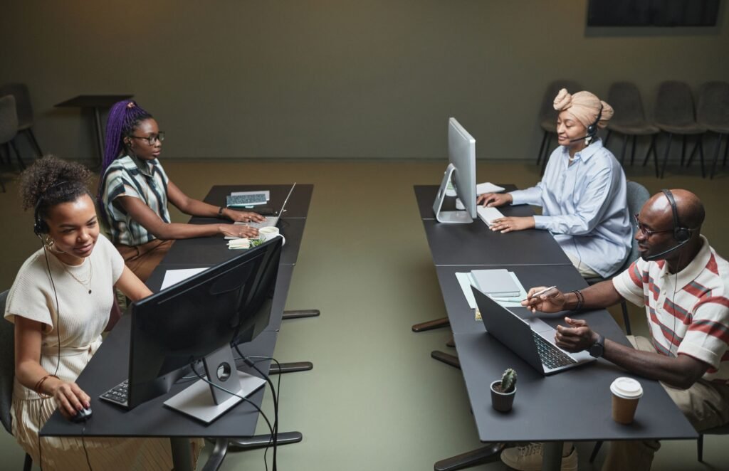 business process outsourcing operations team collaborating in modern BPO center