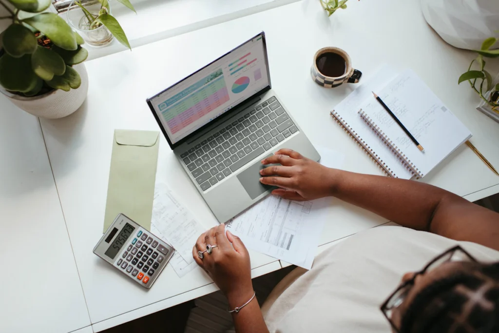 Business professional reviewing outsourcing costs and commercial options