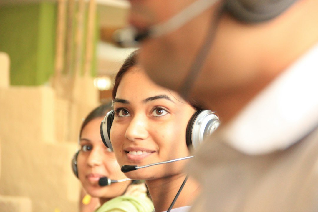 customer support agents working with AI technology